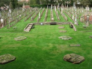 The graveyard is huge and some of the stones are aged beyond reading.