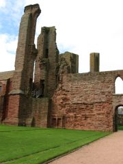 The first monks were a family of grey-robed Tironensian monks from Kelso.