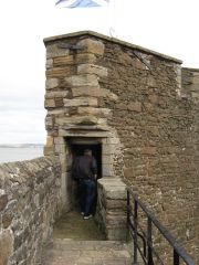 Peter walking into the interior of the wall.