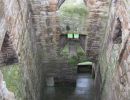 View of central interior of Linlithgow. All the James had a hand here. James I started it in early 1400s. Statement of wealth rather than for protection.