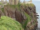 Cliffs on three sides, narrow path entry on fourth.