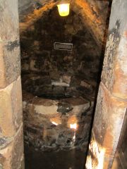 Opening to the bottle prison. People were lowered in by rope - no window, no air circulation, nothing but a 6-8' circle 20' deep in the rock.