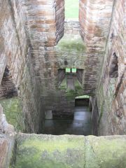 View of central interior of Linlithgow. All the James had a hand here. James I started it in early 1400s. Statement of wealth rather than for protection.