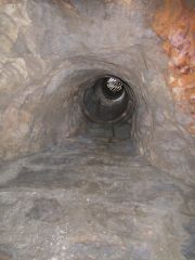 This is where the tunnel from outside the castle was started. Now it has a manhole cover on it..